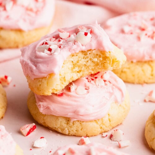 Soft and buttery inside of a peppermint meltaway cookie with pink frosting.