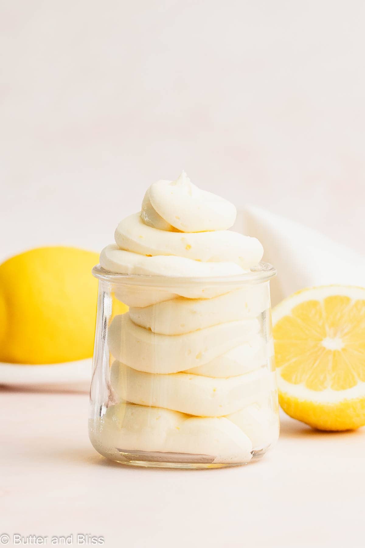 Smooth lemon buttercream swirled in a pretty glass jar.