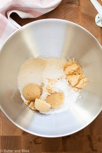Mixig bowl of dry ingredients, including sugar and peanut butter powder.