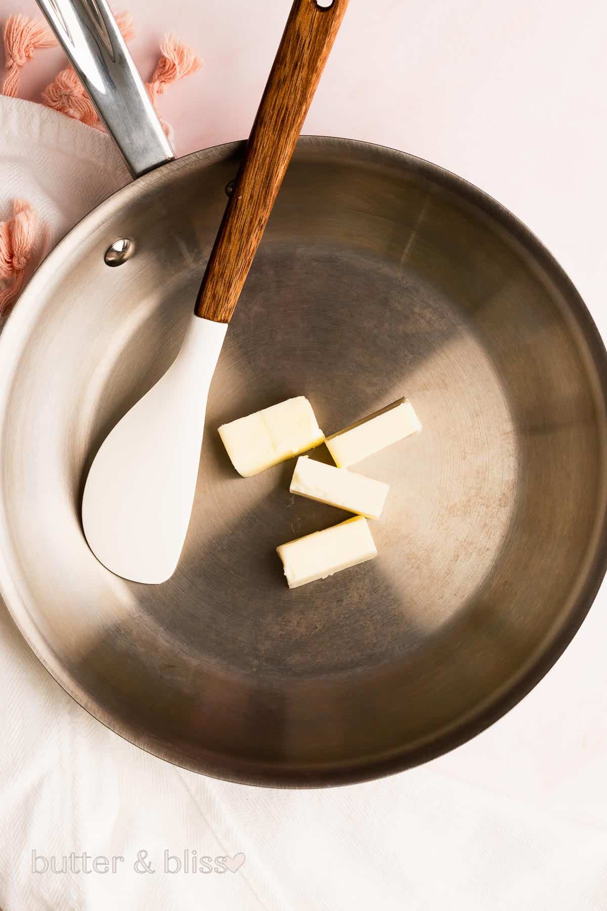 Butter added to a small skillet.