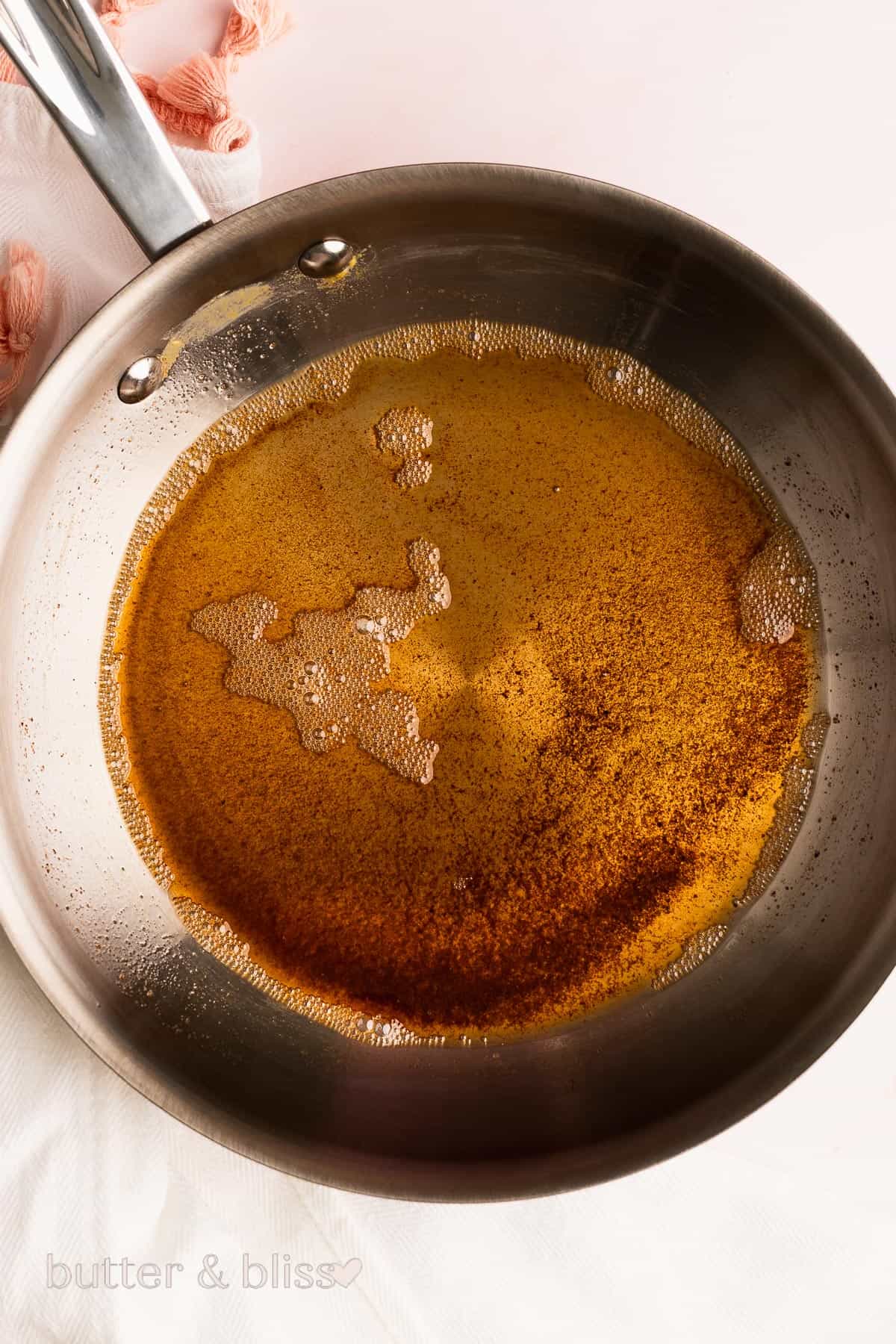 Butter in a small saucepan heated to make brown butter.