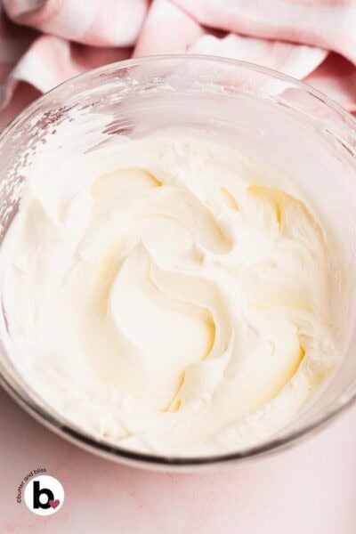 A bowl full of fluffy whipped cream stabilized with marshmallow.