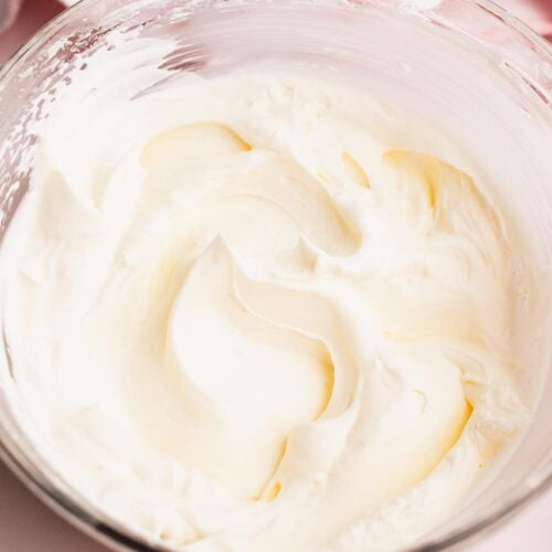 A bowl full of fluffy whipped cream stabilized with marshmallow.