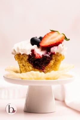 Vanilla berry compote inside a vanilla cupcake.