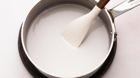 Coconut cream and oil melted in a small saucepan.