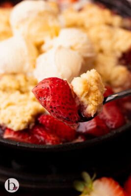 Spoonful of strawberry cobbler.