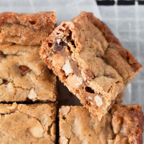 Small batch blondies cut into squares with chewy nut filled centers.
