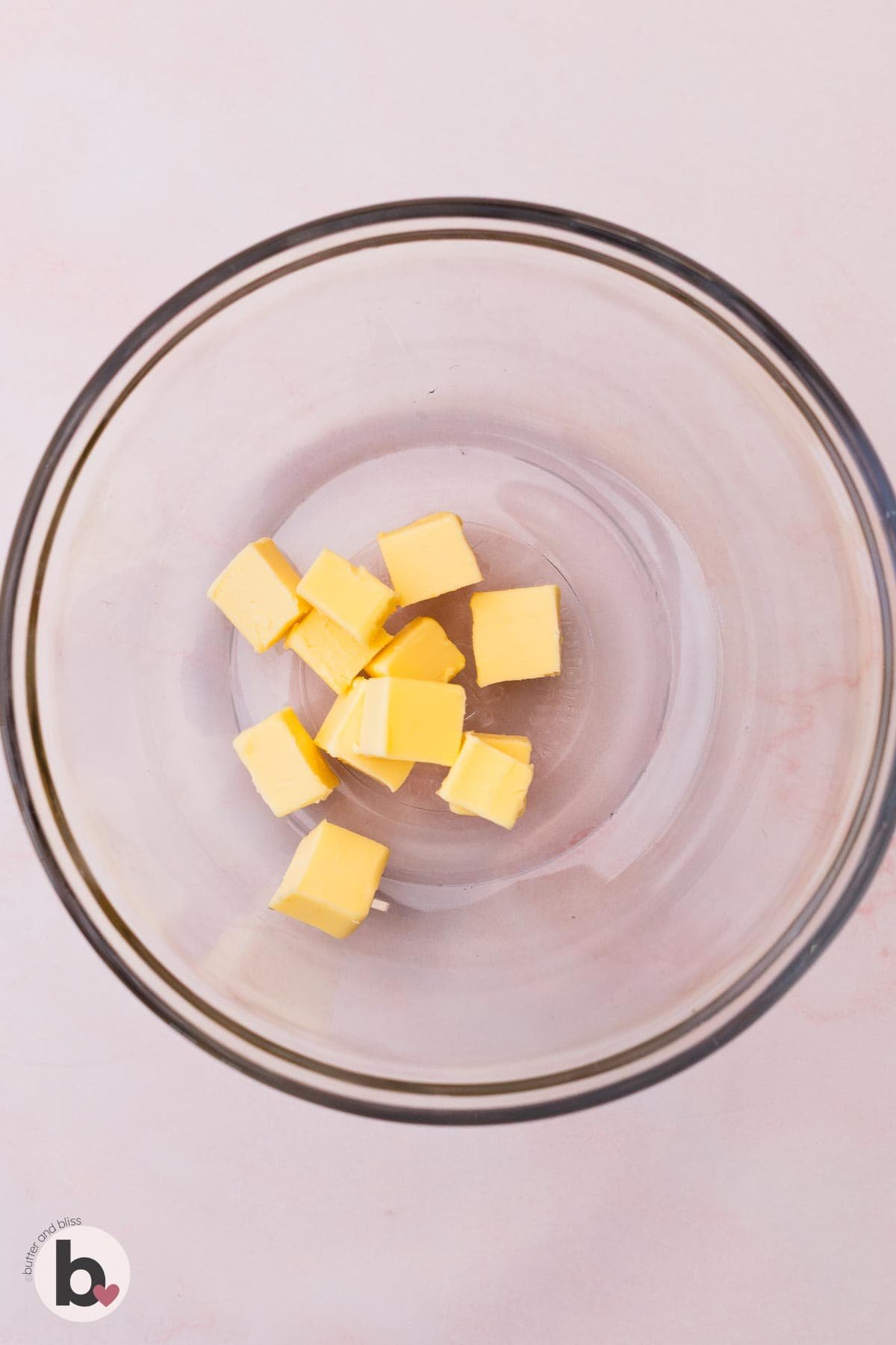 A mixing bowl with cubed butter.