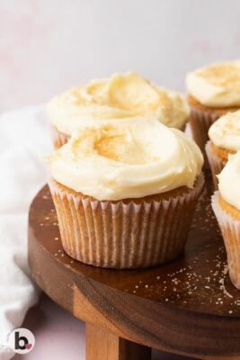 Creamy frosting swirled onto a snickerdoodle cupcake.
