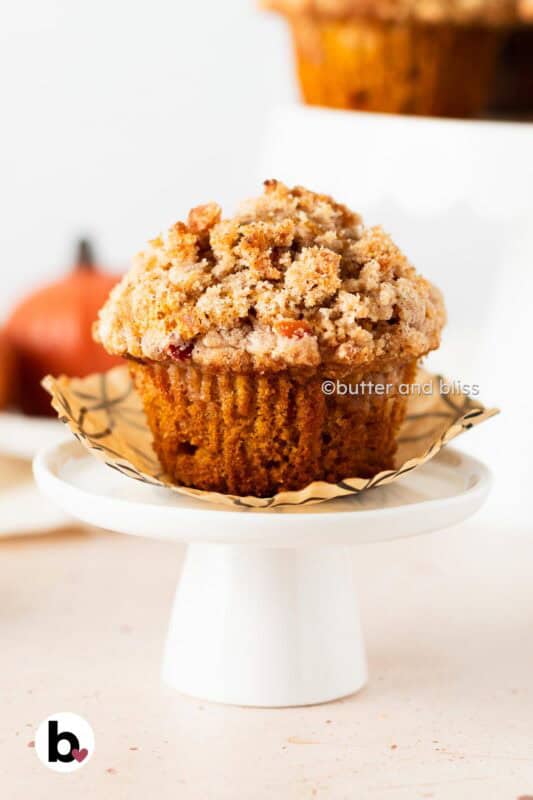 Butter and Bliss apple pumpkin streusel muffin on mini cupcake stand.