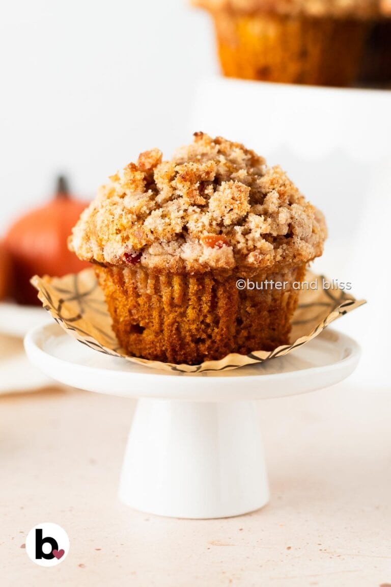 Butter and Bliss apple pumpkin streusel muffin on mini cupcake stand.