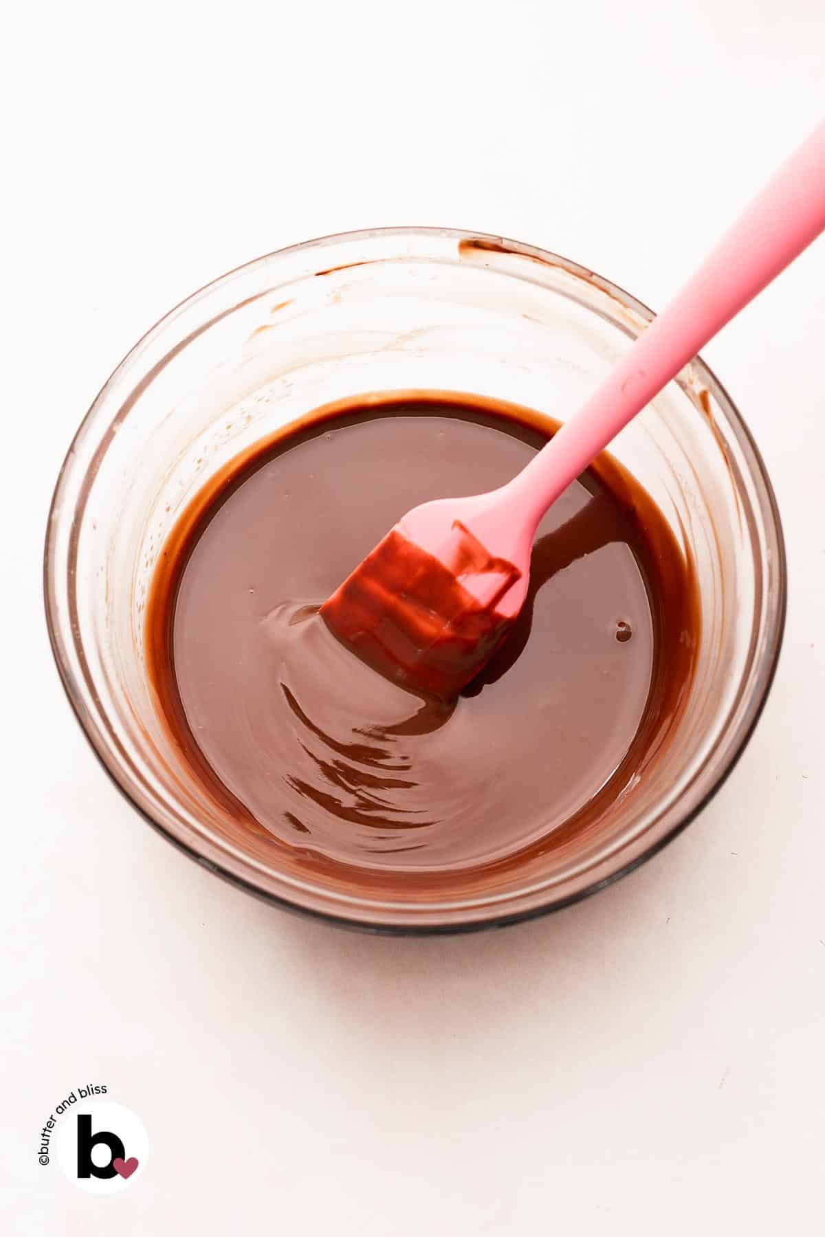 Melted chocolate and butter in a mixing bowl.