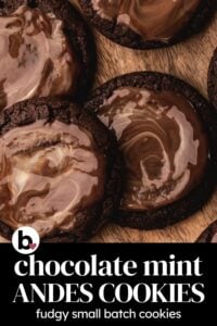 Pinterest pin for fudgy chocolate mint Andes cookies with melted candy on top on a wood tray.