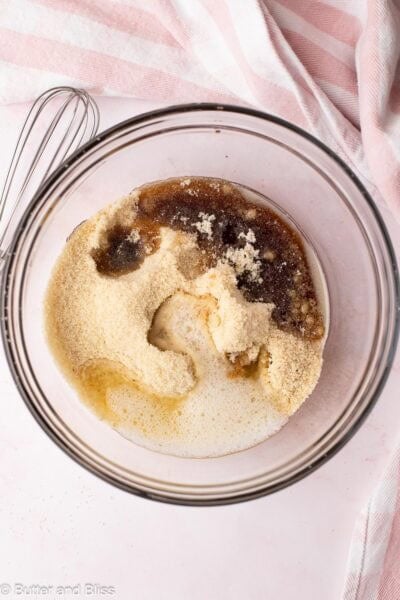 Batter for almond flour and maple syrup cookies in a mixing bowl.