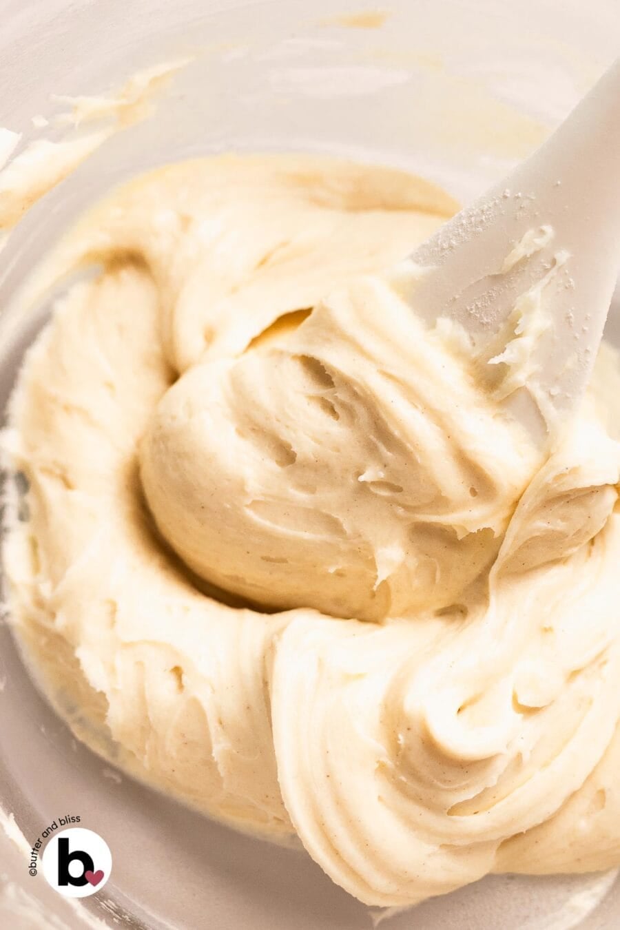 Bowl of thick and creamy cream cheese buttercream.