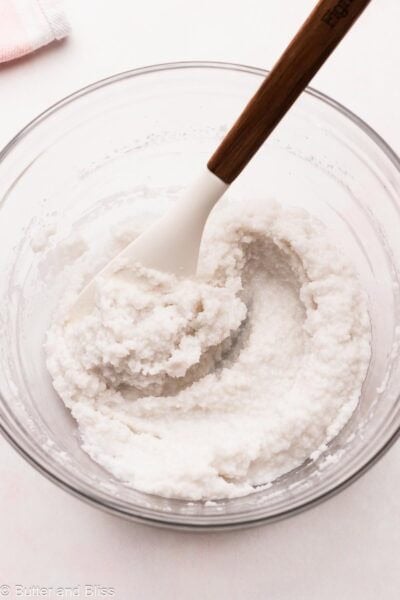 First stage of making vanilla frosting without butter in a mixing bowl.