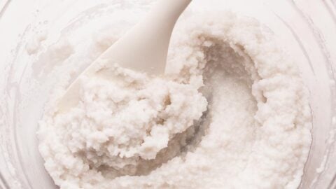 First stage of making vanilla frosting without butter in a mixing bowl.