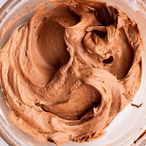A mixing bowl full of peanut butter whipped chocolate ganache.