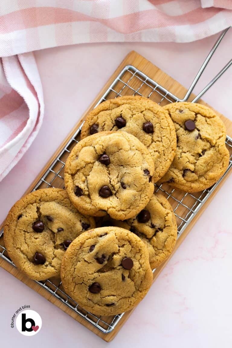 Small batch of chocolate chip cookies on a wire cooling rack.