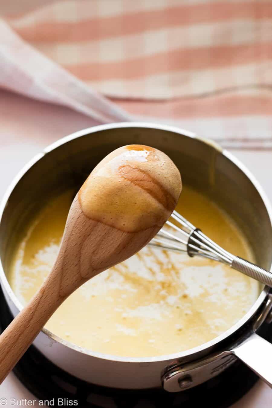 Swipe of lemon curd off the back of a wooden spoon.