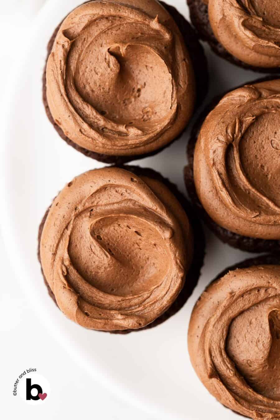 Small batch whipped chocolate buttercream swirled onto cupcakes.