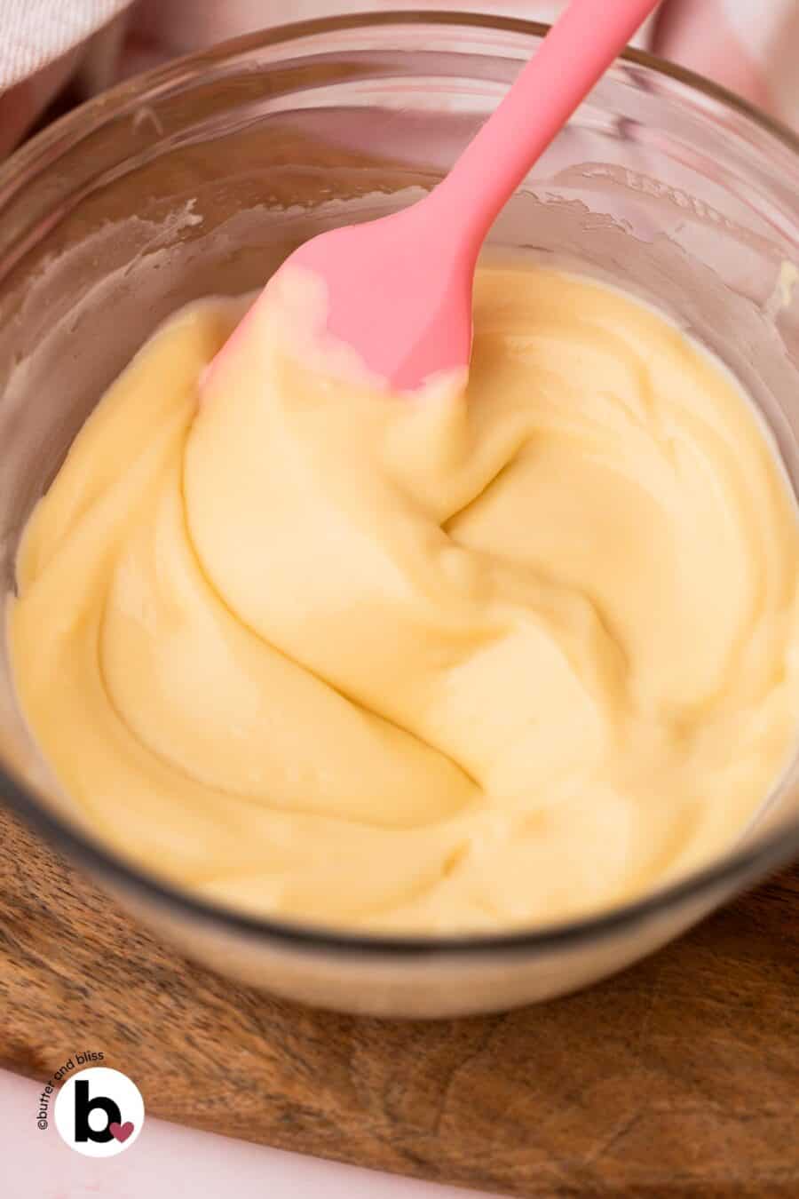 Creamy vanilla pudding in a mixing bowl.