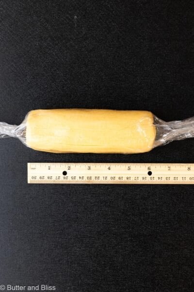 Butter cookie dough rolled into a 6-inch log.