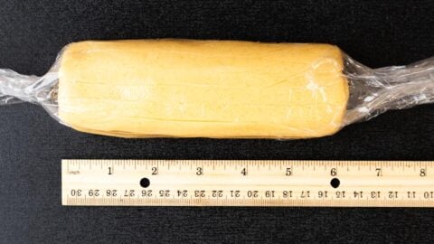 Butter cookie dough rolled into a 6-inch log.