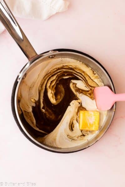 Maple syrup in a small saucepan to make caramel with cream and butter.