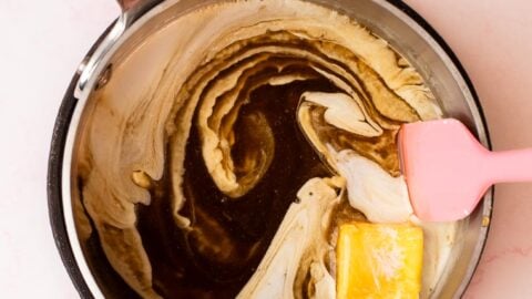 Maple syrup in a small saucepan to make caramel with cream and butter.