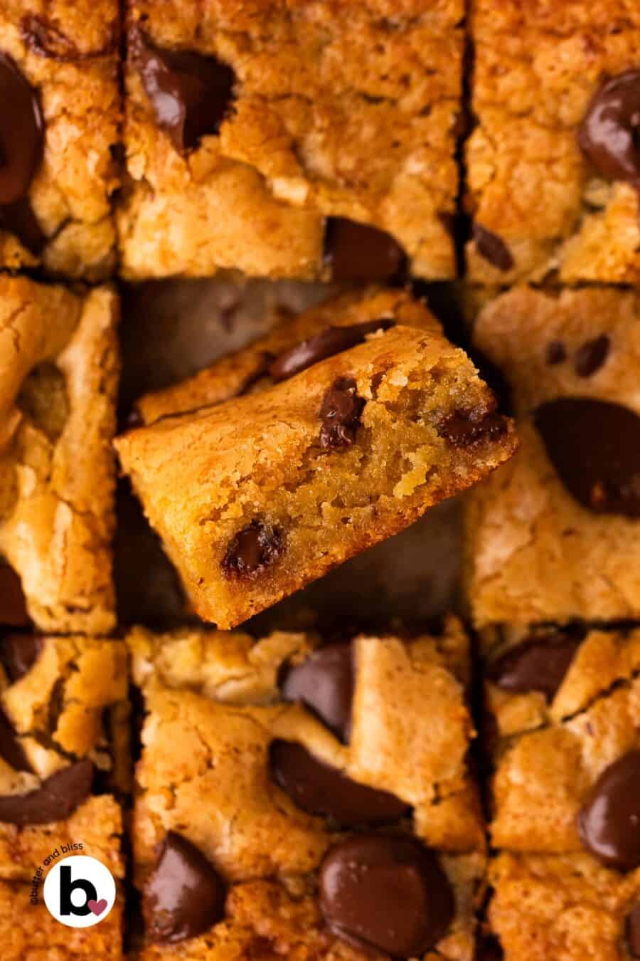 Small batch blondies cut into squares with one standing up to reveal the chewy center.